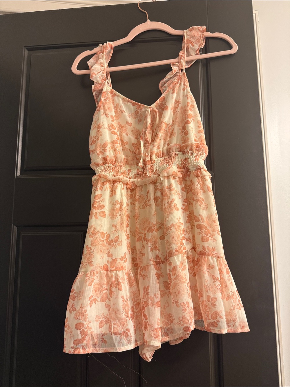 Pink and white floral romper new with tags